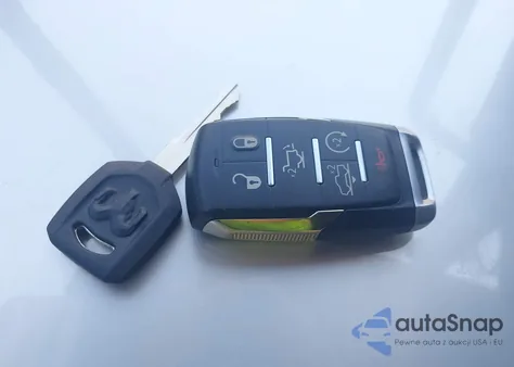 2022 Ram 1500 Limited Longhorn 4X4 5'7 Box z USA, uszkodzony, nr VIN 1C6SRFKM5NN120346